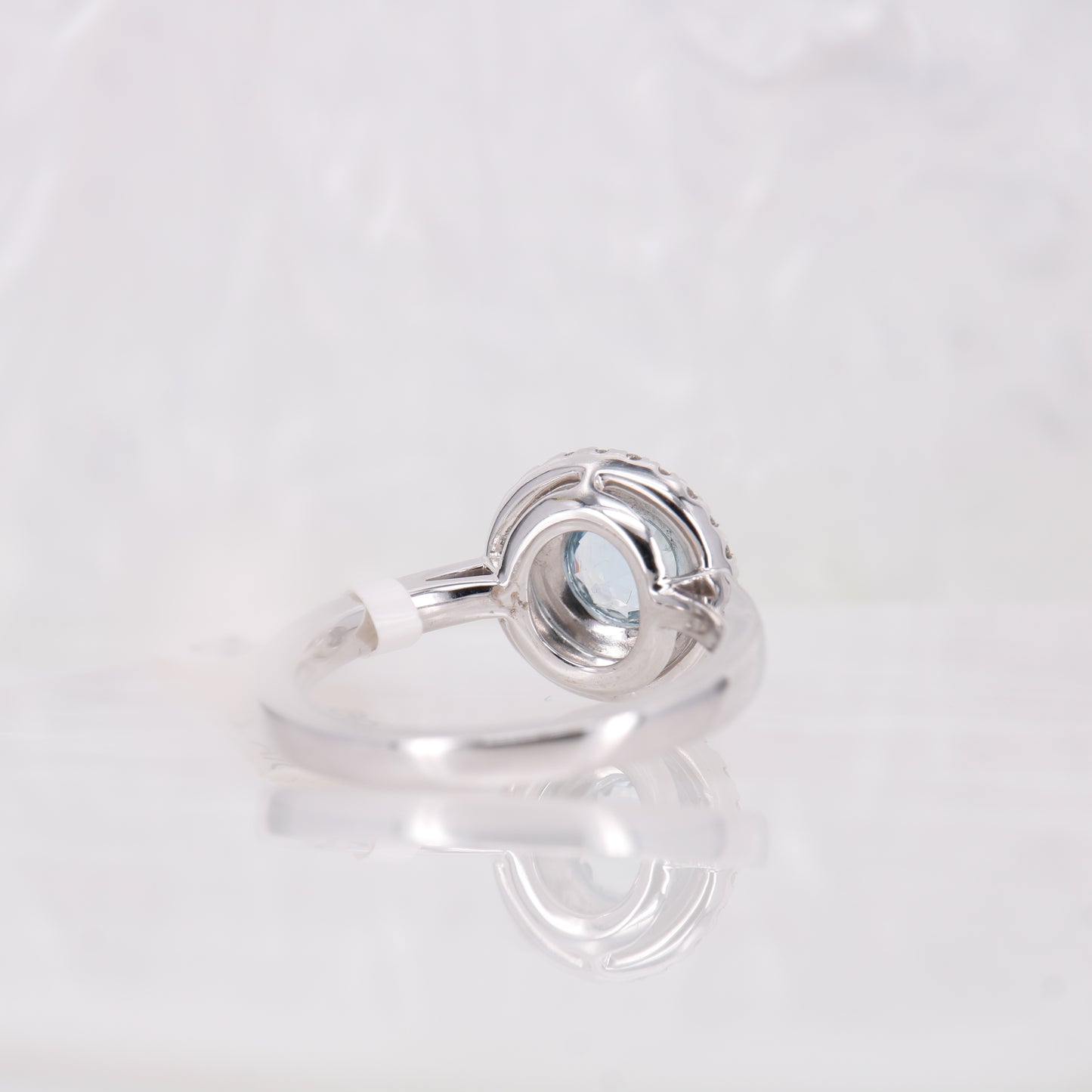 18ct White Gold Aquamarine and Diamond Ring. 0.78ct aquamarine and a double halo of diamonds. 