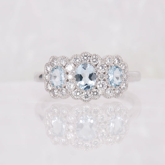 Aquamarine and Diamond Flower Trilogy Ring set in 18ct White Gold. 