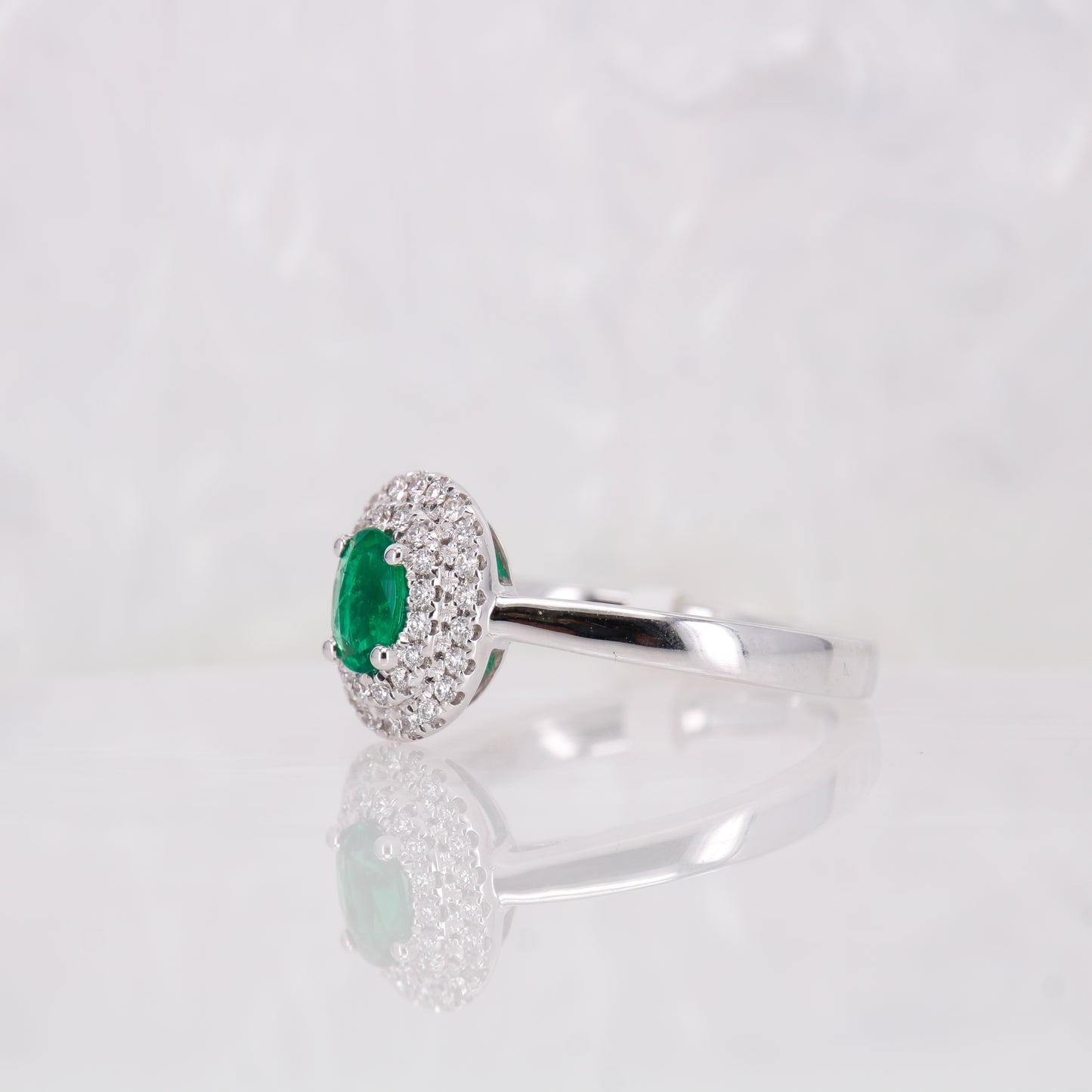 18ct White Gold Oval Cut Emerald and Diamond Ring