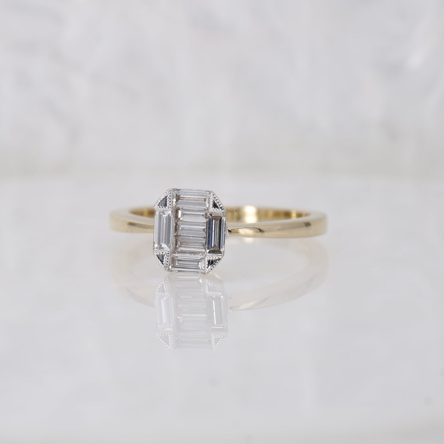 Pre-Owned baguette cut diamond cluster ring, featuring 7 stunning baguette cut diamonds set in a hexagonal shape. Perfect as a vintage inspired engagement ring.
