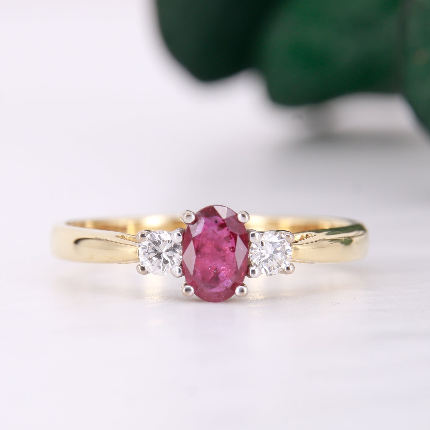 Preowned Oval cut Ruby and Diamond Trilogy Three Stone Engagement Ring