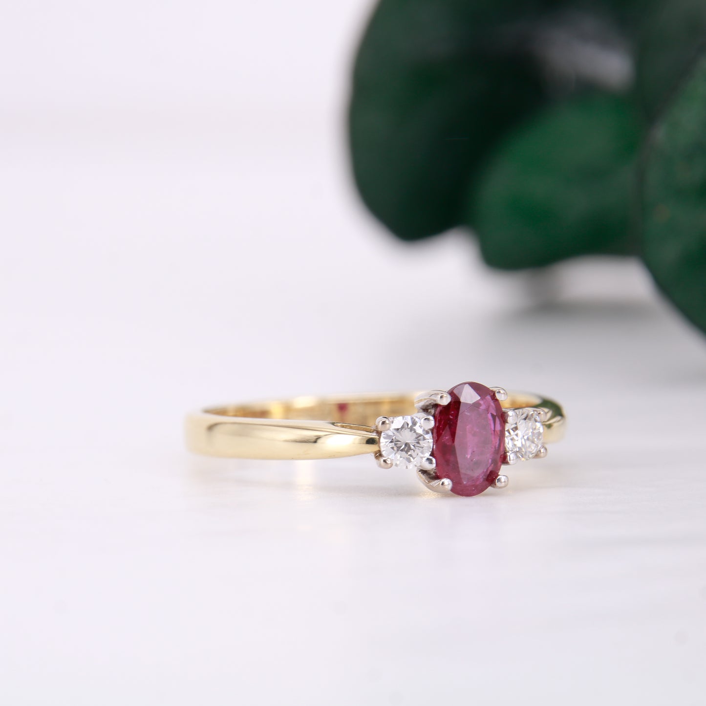 Preowned Oval cut Ruby and Diamond Trilogy Three Stone Engagement Ring