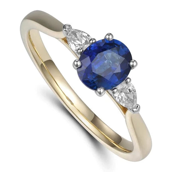 Sapphire and Diamond Oval Cut Engagement Ring Pear Cut Side Stones