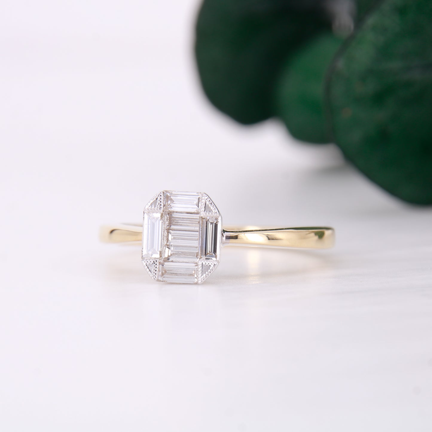 Pre-Owned baguette cut diamond cluster ring, featuring 7 stunning baguette cut diamonds set in a hexagonal shape. Perfect as a vintage inspired engagement ring.